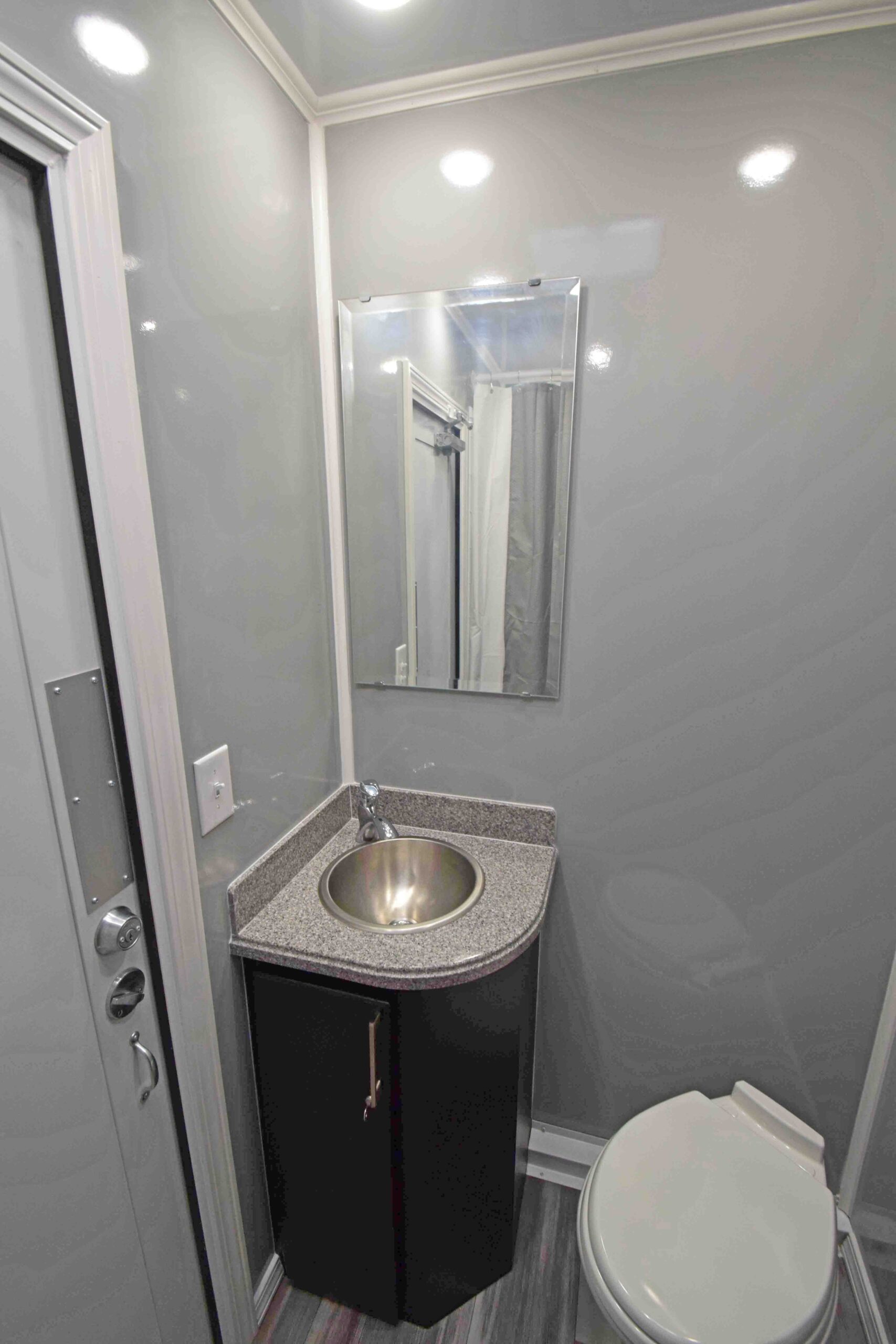 four station shower combo sink and toilet